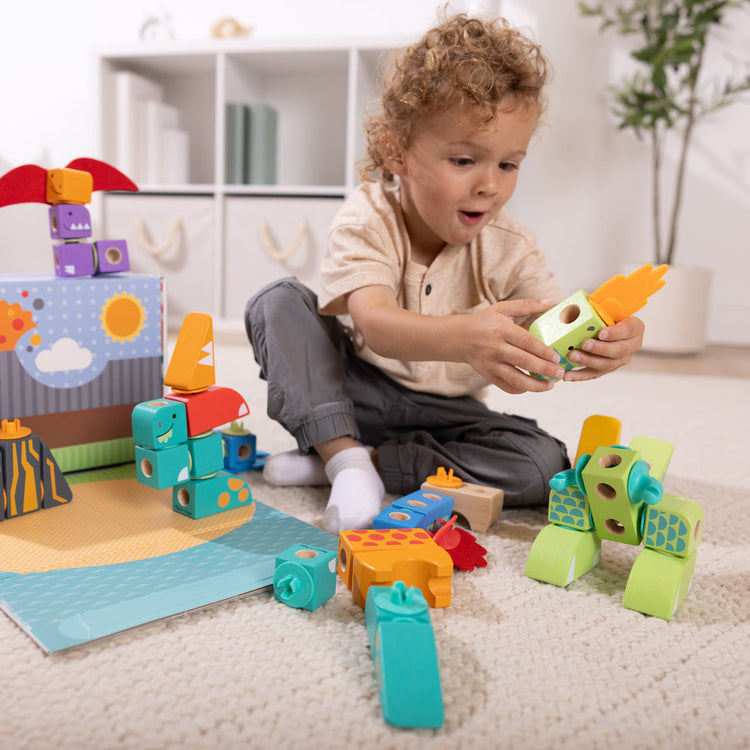 Melissa & Doug How to Host a Blockables Block Party Building Playdate at Home blog post child playing