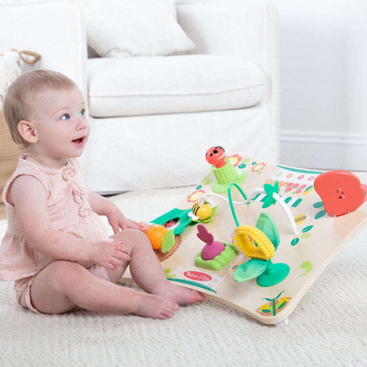Melissa & Doug Holiday Gifts for Kids That Wow blog post child playing