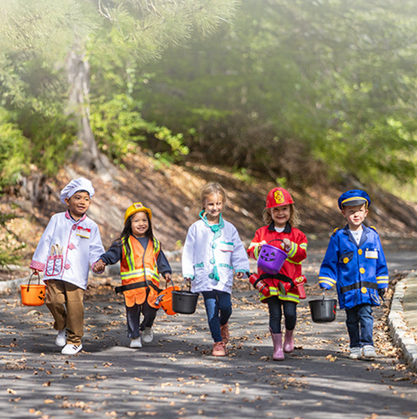Melissa & Doug Purposeful Play: Dress-Up Fun for Halloween & All Year Long blog post children wearing role play costumes for trick or treating
