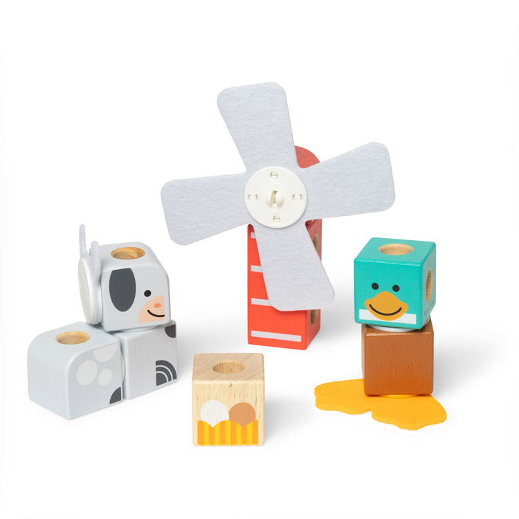 A kid playing with The Melissa & Doug Blockables™ Farm Friends Snap And Play, Mix And Match Connectable Wooden Building Blocks Play Set Toy for Preschool Boys And Girls (16 Pcs)