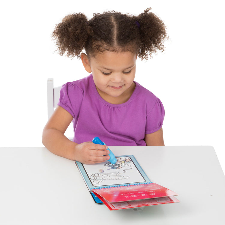 A child on white background with The Melissa & Doug On the Go Water Wow! Reusable Water-Reveal Activity Pad Travel Toy – Adventure