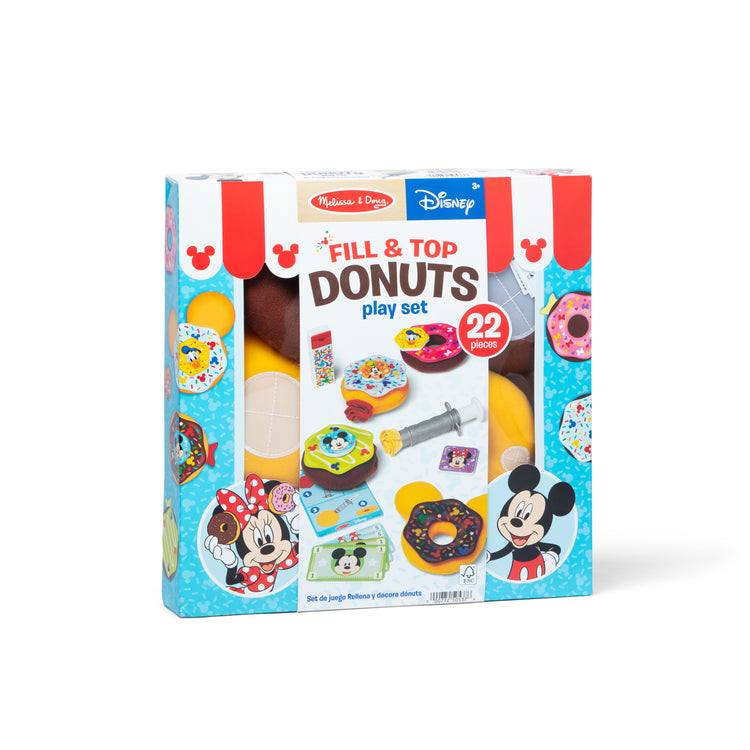The front of the box for The Melissa & Doug Disney Fill and Top Donut Play Set with 4 Squishy Donuts and Wooden Toppings - For Ages 3+