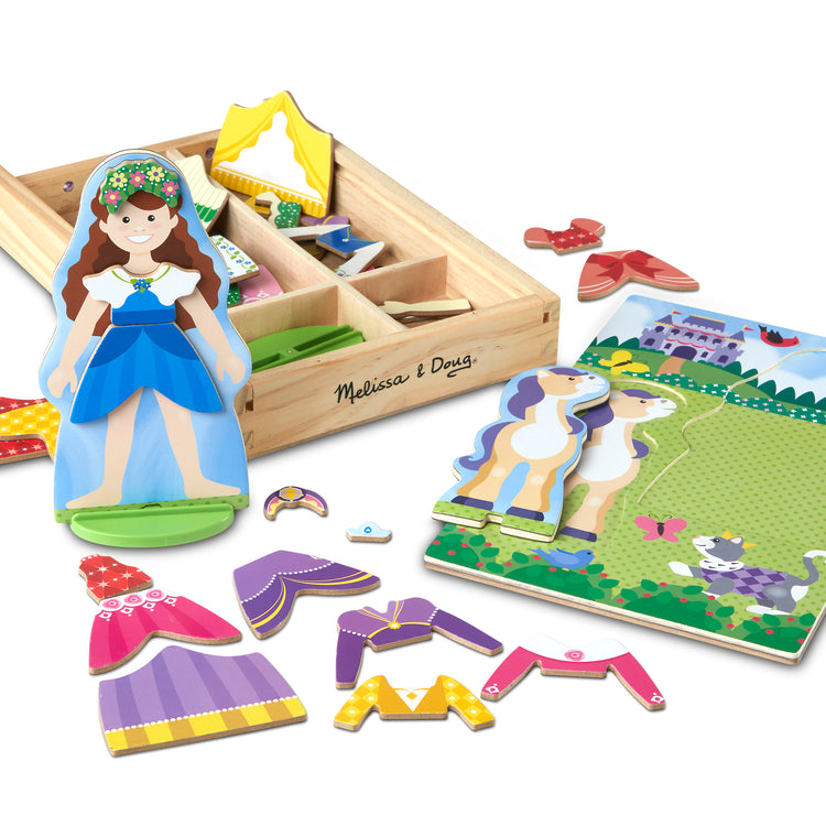 The loose pieces of The Melissa & Doug Princess & Horse Magnetic Pretend Play Wooden Dolls Pretend Play Set (35 pcs)