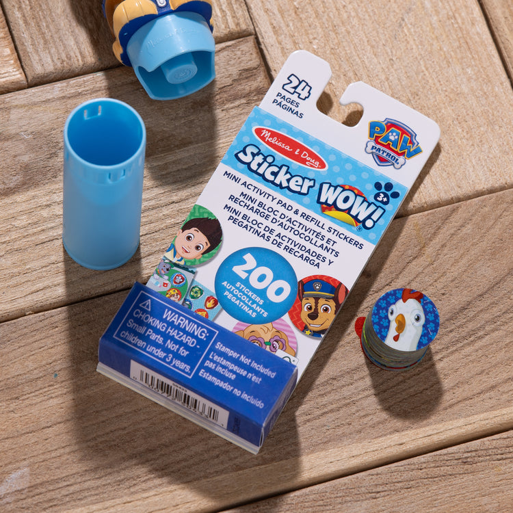 A playroom scene with The Melissa & Doug Sticker WOW!™ Mini Activity Pad and 200+ Refill Stickers for Sticker Stamper Arts and Crafts Fidget Toy Collectibles – PAW Patrol Stickers