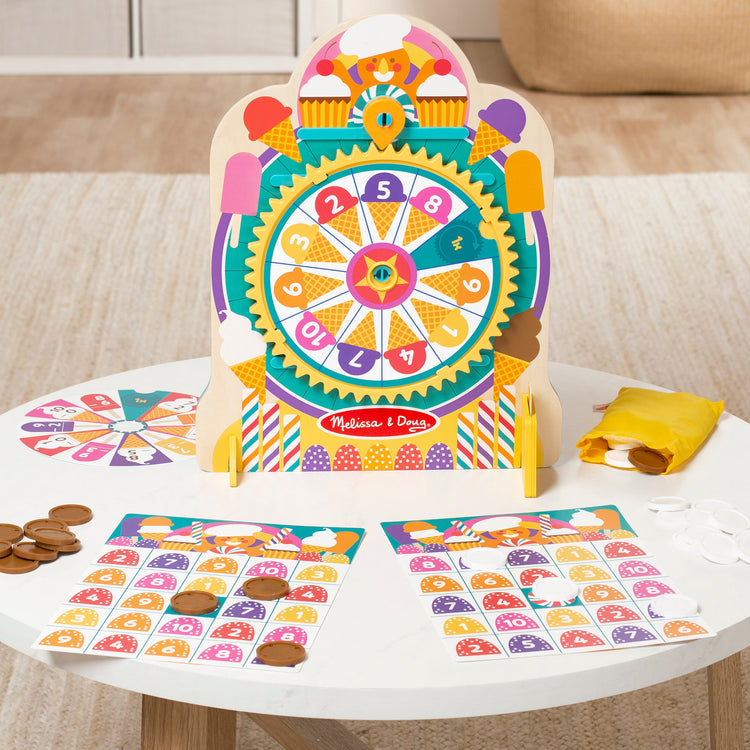 A playroom scene with The Melissa & Doug Fun at the Fair! Wooden Double-Sided Roulette & Plinko Games