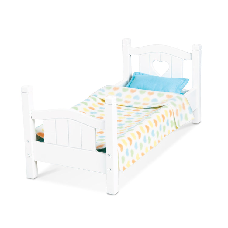 An assembled or decorated The Melissa & Doug Mine to Love Wooden Play Bed for Dolls, Stuffed Animals - White (8.7”H x 9.1”W x 20.7”L Assembled)