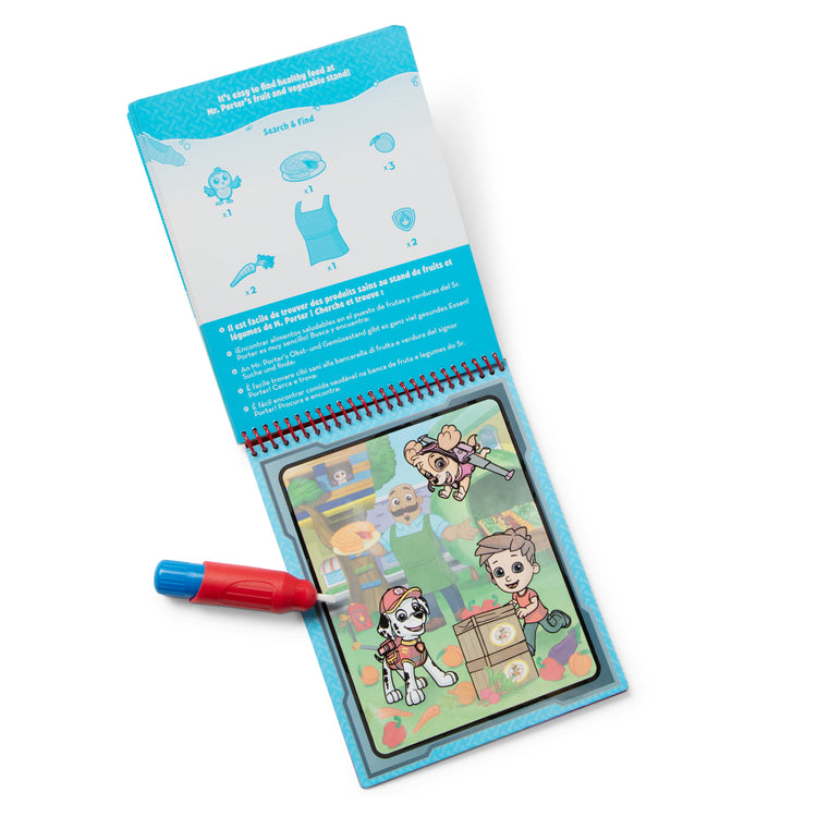 A kid playing with The Melissa & Doug Water WOW! PAW Patrol Marshall Reusable Coloring Book with Refillable Water Pen - For Ages 3+
