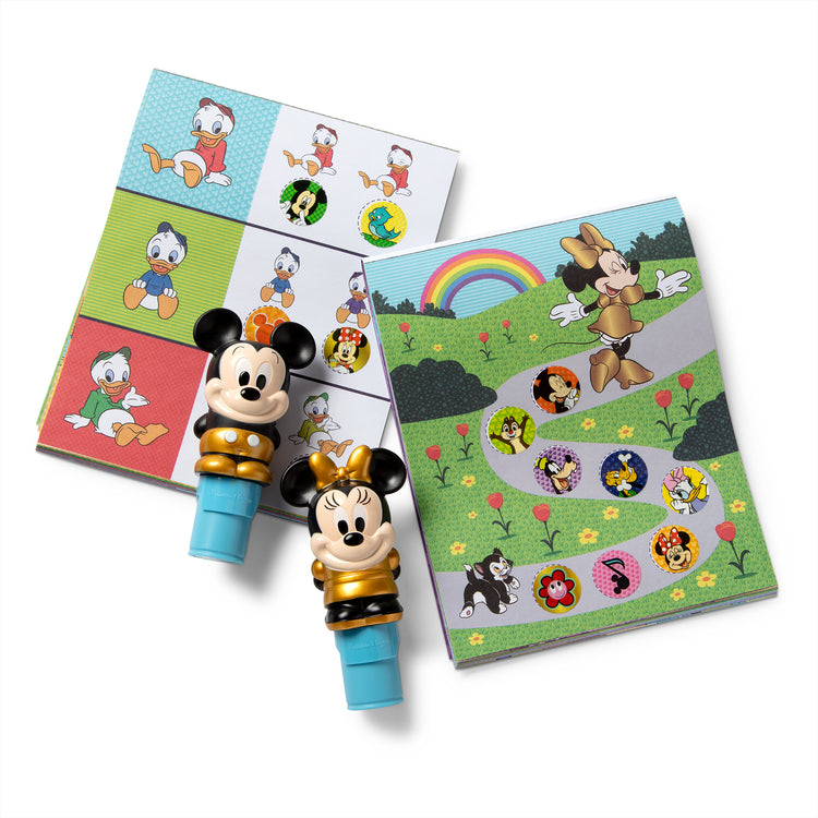 The loose pieces of The Melissa & Doug Sticker WOW! Disney Special Edition Pack with Mickey & Minnie Stampers and 900 Stickers - Ages 3+