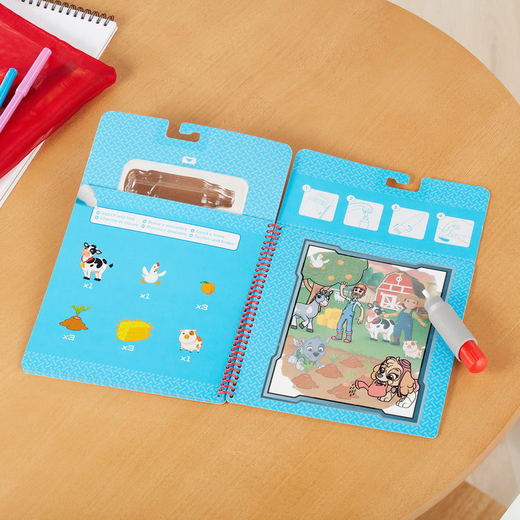A playroom scene with The Melissa & Doug PAW Patrol Water Wow! 3-Pack - Skye, Chase, Marshall Water Reveal Travel Activity Pads