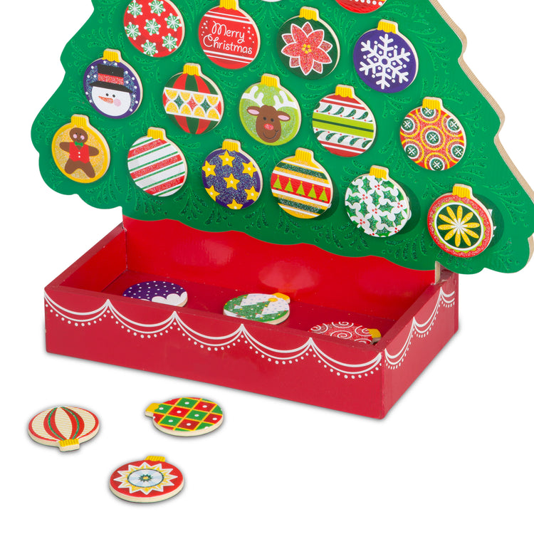 An assembled or decorated The Melissa & Doug Countdown to Christmas Wooden Advent Calendar - Magnetic Tree, 25 Magnets