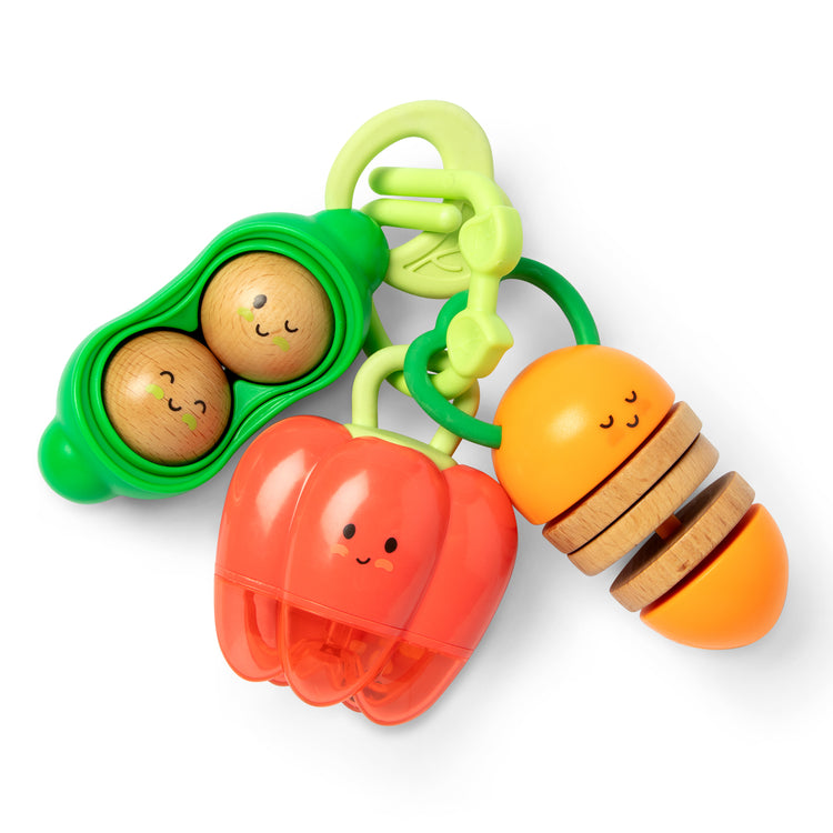 The loose pieces of The Farmers Market Veggie Rattles Trio