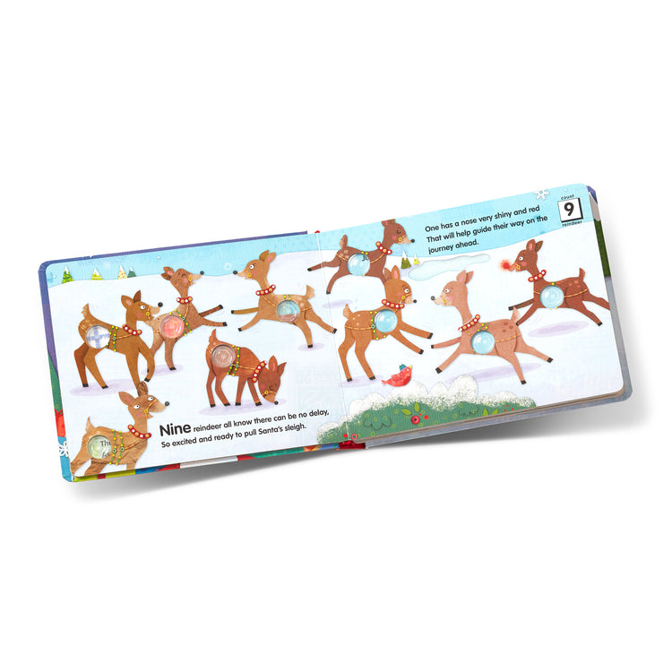 The loose pieces of The Melissa & Doug Children's Book - Poke-a-Dot:The Night Before Christmas (Board Book with Buttons to Pop)