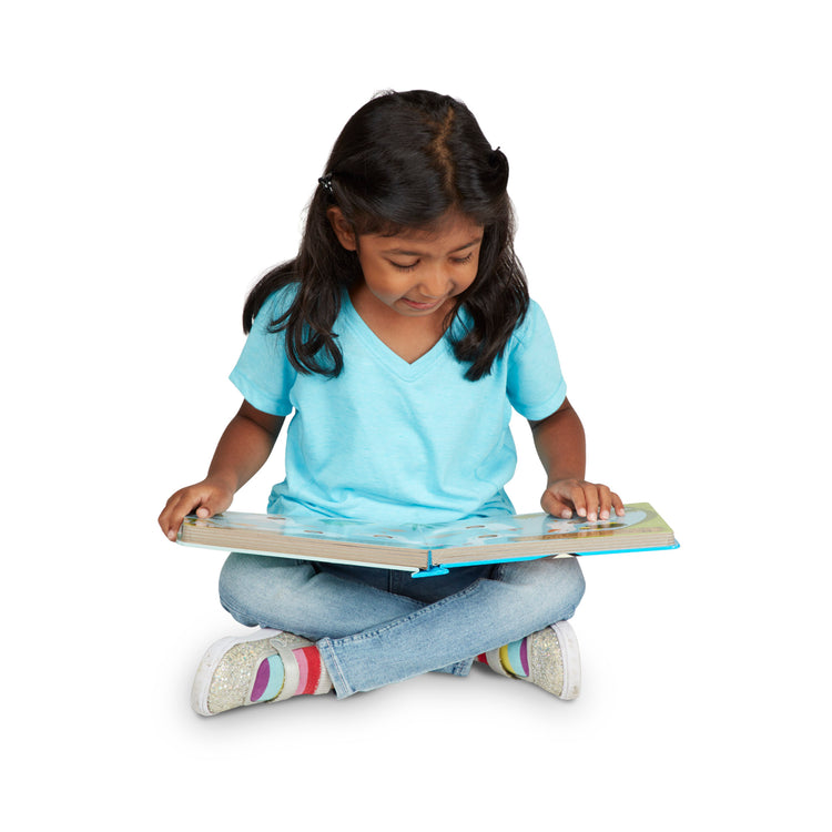 A child on white background with The Melissa & Doug Children's Book - Poke-a-Dot: Old MacDonald’s Farm (Board Book with Buttons to Pop)