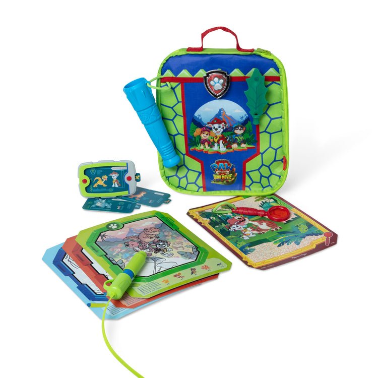 A kid playing with The Melissa & Doug PAW Patrol Dino Adventure Water WOW! and Role Play Set in Take-Along Case - For Ages 3+