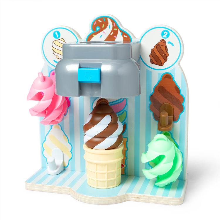 The loose pieces of The Melissa & Doug Swirl and Serve Wooden Ice Cream Play Set with Dispenser and 4 Swirls - For Ages 3+
