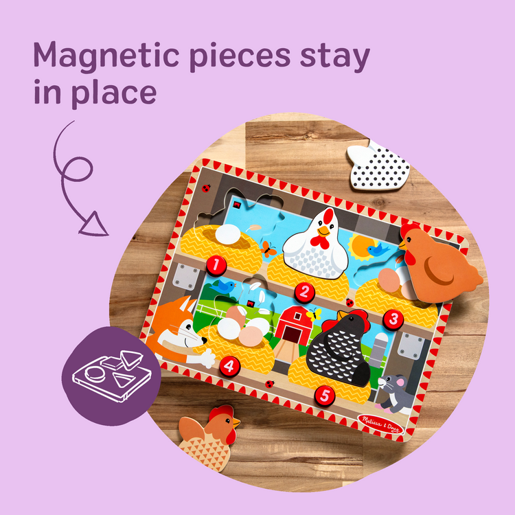 The front of the box for The Melissa & Doug Happy Hens Push to Pop Wooden Puzzle, Montessori-Inspired Toddler Puzzles with Magnetic Pieces and Colorful Puzzle Board, Preschool Toys for Girls & Boys 18 months+