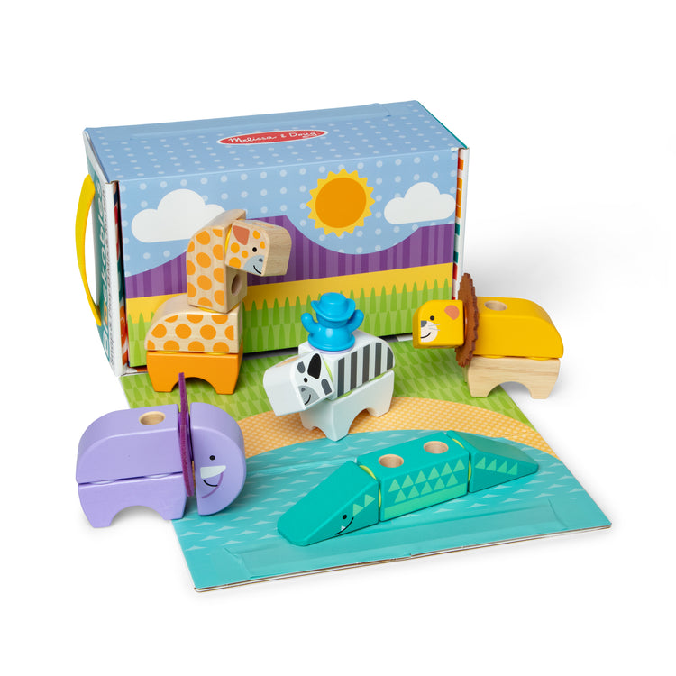 A kid playing with The Melissa & Doug Blockables™ Safari Snap And Play, Mix And Match Connectable Wooden Building Blocks Play Set Toy for Preschool Boys And Girls (34 Pcs)