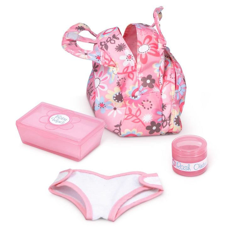 The loose pieces of the Melissa & Doug Mine to Love Doll Diaper Changing Set With Accessories (7 pcs)