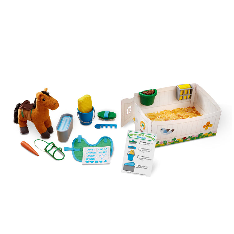 The loose pieces of the Melissa & Doug Feed & Groom Horse Care Play Set With Plush Stuffed Animal (23 pcs)