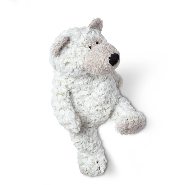 The loose pieces of the Melissa & Doug Greyson Bear Stuffed Animal