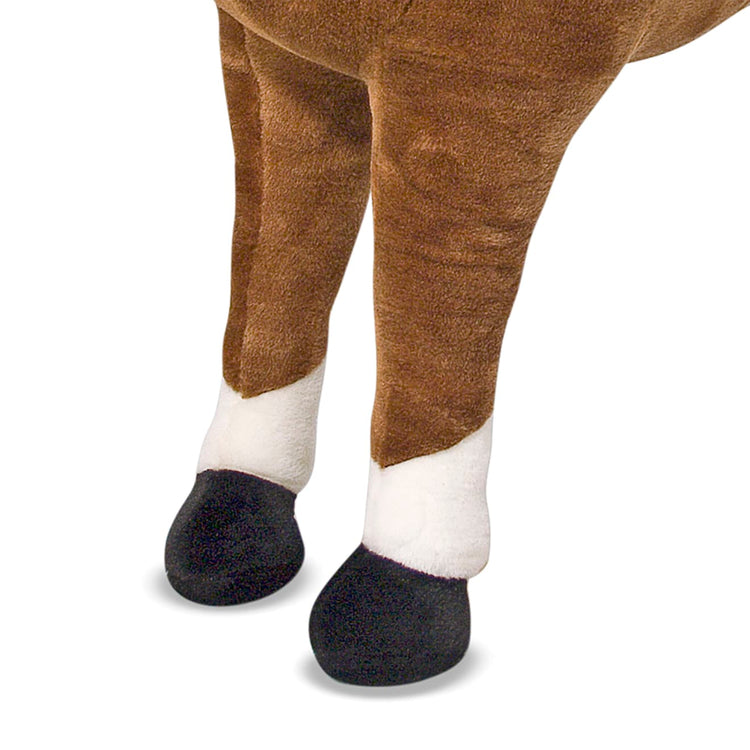 The loose pieces of the Melissa & Doug Giant Horse - Lifelike Stuffed Animal (nearly 3 feet tall)