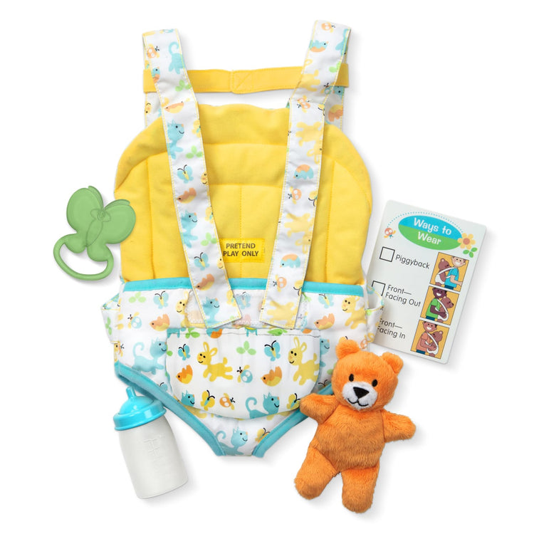 the Melissa & Doug Mine to Love Carrier Play Set for Baby Dolls with Toy Bear, Bottle, Rattle, Activity Card