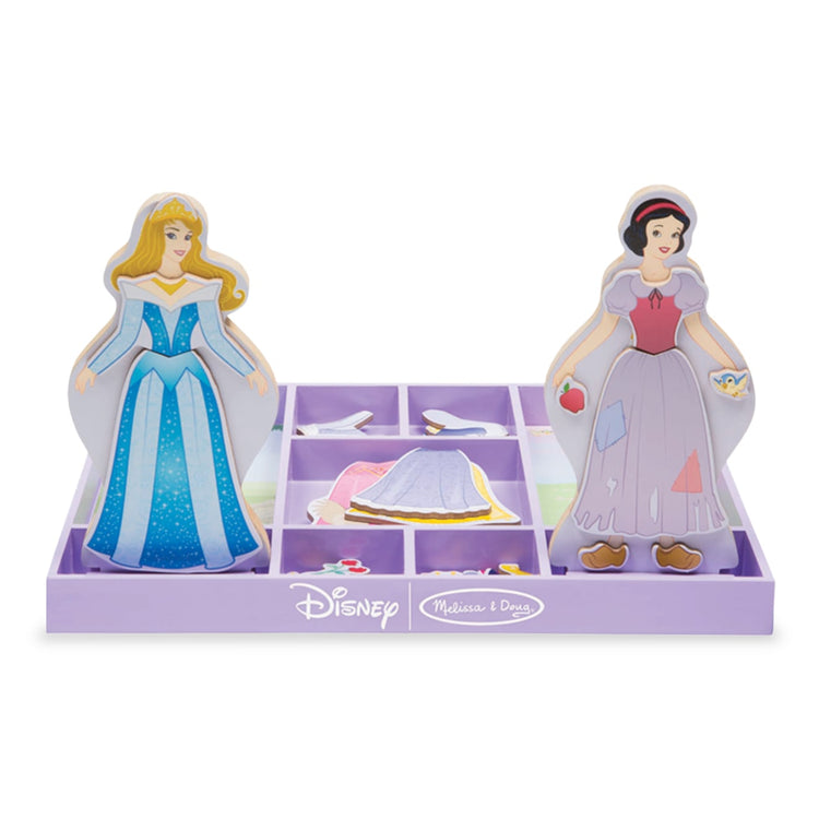 The loose pieces of the Melissa & Doug Disney Sleeping Beauty and Snow White Magnetic Dress-Up Wooden Doll Pretend Play Set (40+ pcs)